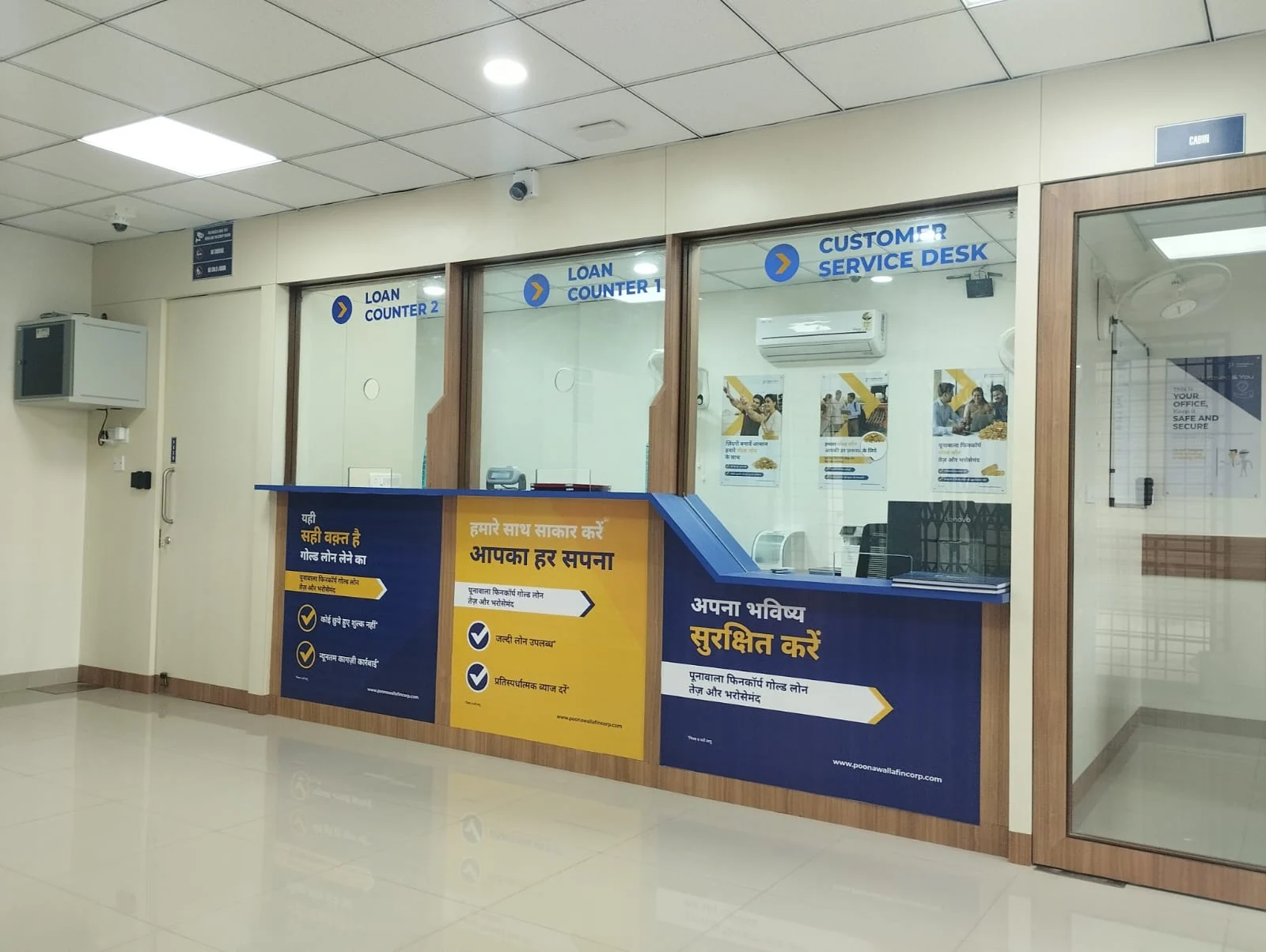 Customer-service counters at Poonawalla Fincorp’s Kankroli branch.