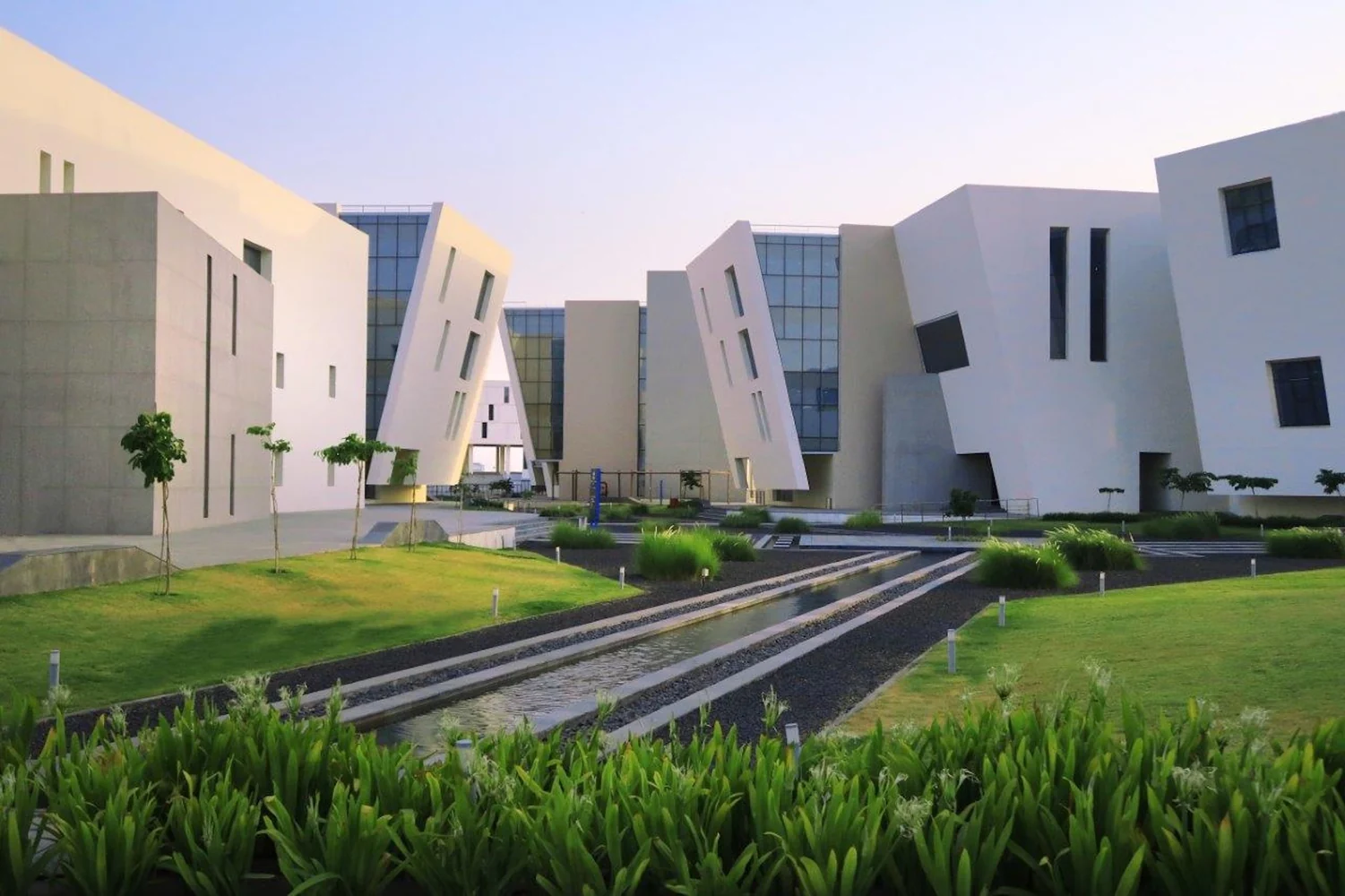 TCS Indore U Blocks: campus buildings and landscaped grounds.